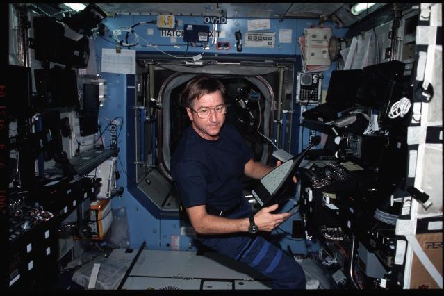 Former NASA astronaut and Expedition Three Mission Commander Frank L. Culbertson is seen here in the U.S. Laboratory / Destiny on the ISS. Culbertson had a unique perspective on 9/11, as he was the only American not on the planet during the tragic ebents of that day. Instead, he watched the towers fall from 250 miles above, and this week the former astronaut opens up about his experience watching it all unfold from space that day. Photo Credit: NASA