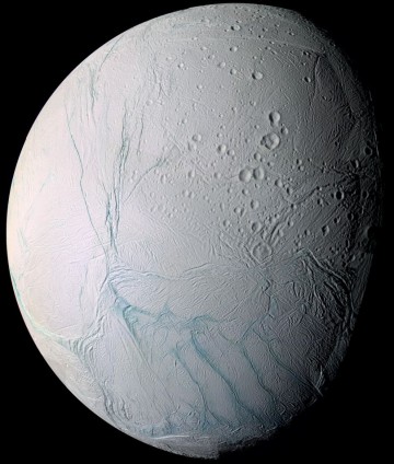 A high-resolution image of Enceladus' south polar region, taken by the Cassini spacecraft from a distance of 270 km during a close fly by in 2005. The characteristic geologic formations known as 'tiger stripes' are clearly visible in false-color blue at the bottom. Image Credit:  Cassini Imaging Team, SSI, JPL, ESA, NASA