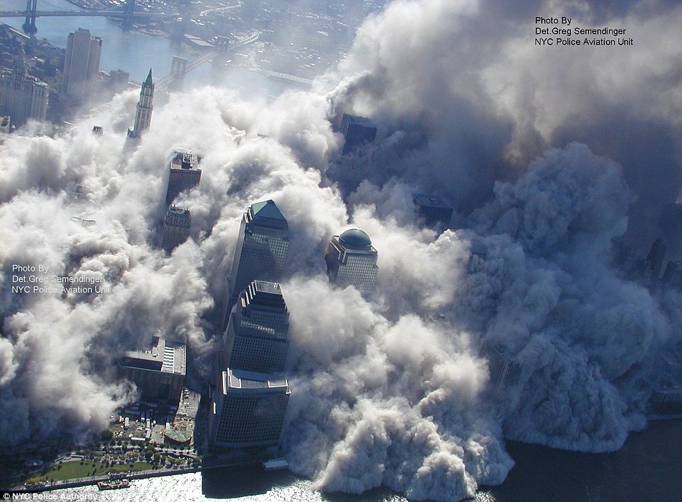 Manhattan engulfed in smoke after the collapse of the World Trade Center Towers on Sept. 11, 2001. Photo Credit: NYC Police Authority / Greg Semendinger