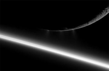 As if hovering above Saturn's rings, Enceladus is imaged by the Cassini spacecraft while the moon's south polar plumes eject water ice particles into space. Image Credit: NASA/JPL/Space Science Institute
