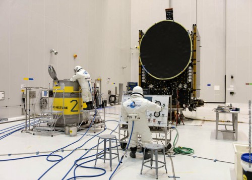 The Optus-10 satellite undergoes fueling at the Guiana Space Centre in August 2014. Photo Credit: Arianespace