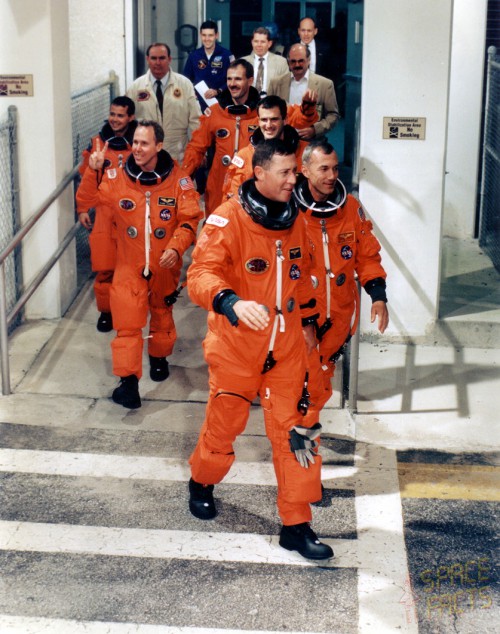 The STS-68 crew departs the Operations & Checkout Building on launch morning. Photo Credit: NASA