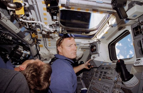 Dave Walker (right) and Mike Gernhardt occupy themselves with their rendezvous responsibilities during STS-69. This mission marked the first shuttle flight to deploy and retrieve as many as two free-flying spacecraft. Photo Credit: NASA 