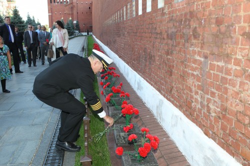 Barry "Butch" Wilmore lays flowers at the Kremlin Wall in Moscow earlier this month, as part of traditional protocols to honor the space heroes of yesteryear. Photo Credit: NASA