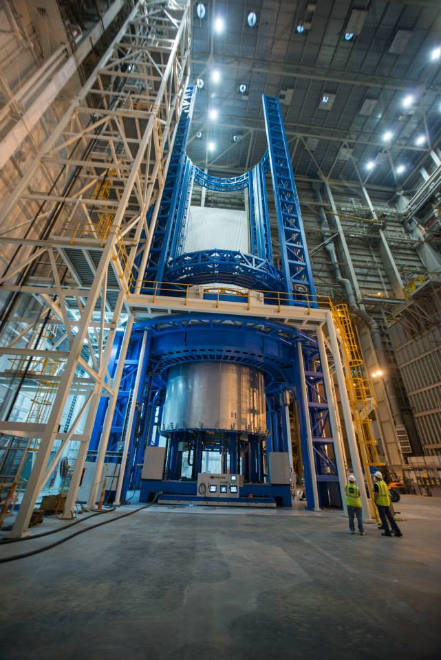 Technicians hoist barrel for SLS core stage recently onto the Vertical Assembly Center at NASA’s Michoud Assembly Facility in New Orleans to perform test welds.  Credit: NASA/Michoud