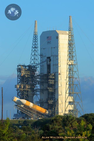 Orion's Delta IV Heavy is hoisted to a vertical orientation at Space Launch Complex (SLC)-37B. Photo Credit: Alan Walters / AmericaSpace