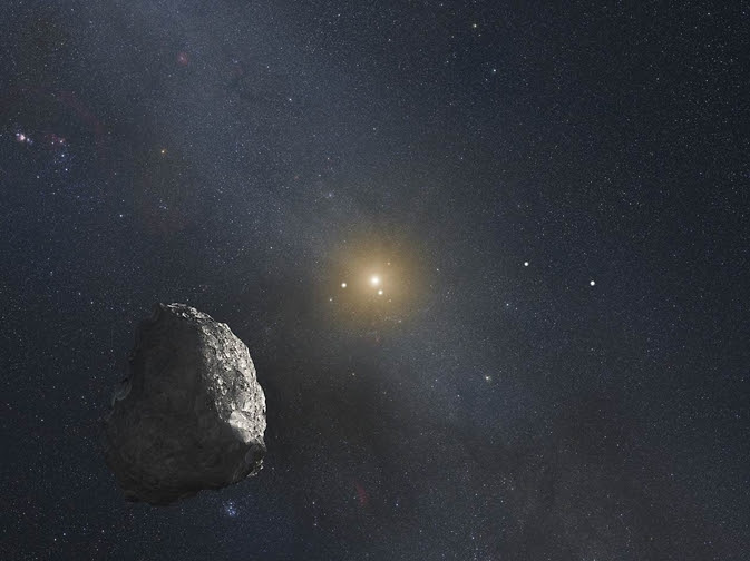 An artist’s impression of a Kuiper Belt object (KBO), located on the outer rim of our solar system at a staggering distance of 4 billion miles from the Sun. A HST survey uncovered three KBOs that are potentially reachable by NASA’s New Horizons spacecraft after it passes by Pluto in mid-2015 Image Credit: NASA, ESA, and G. Bacon (STScI)