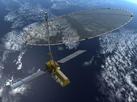 An artist's concept of the planned NASA-ISRO Synthetic Aperture Radar, or NISAR, satellite in orbit, showing the large deployable mesh antenna, solar panels and radar electronics attached to the spacecraft. The mission is a partnership between NASA and the Indian Space Research Organization. Image and Caption Credit: NASA/JPL-Caltech