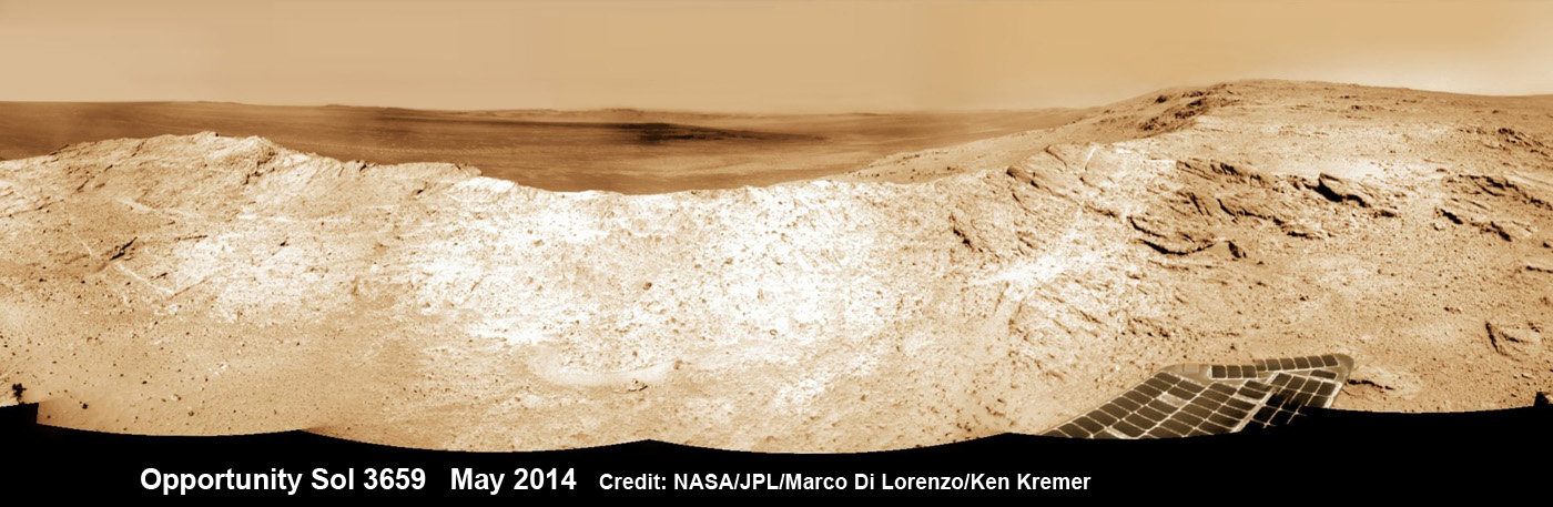 NASA’s Opportunity Mars rover captures sweeping panoramic vista near the ridgeline of 22 km (14 mi) wide Endeavour Crater’s western rim. The center is southeastward and also clearly shows the distant rim.  This navcam panorama was stitched from images taken on May 10, 2014 (Sol 3659) and colorized. Credit: NASA/JPL/Cornell/Marco Di Lorenzo/Ken Kremer-kenkremer.com