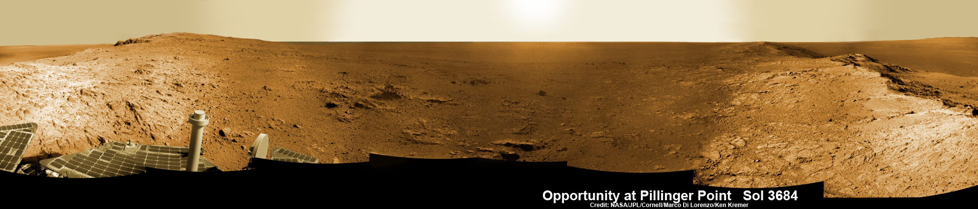 Opportunity Mars rover peers into vast Endeavour Crater from Pillinger Point mountain ridge named in honor of Colin Pillinger, the Principal Investigator for the British Beagle 2 lander built to search for life on Mars. Pillinger passed away from a brain hemorrhage on May 7, 2014.  This navcam camera photo mosaic was assembled from images taken on June 5, 2014 (Sol 3684) and colorized.  Credit: NASA/JPL/Cornell/Marco Di Lorenzo/Ken Kremer-kenkremer.com