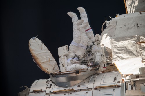 U.S. EVA-27 will commence from the Quest airlock, with Reid Wiseman (EV1) wearing a suit with red stripes and Alexander Gerst (EV2) clad in a pure-white suit. Photo Credit: NASA