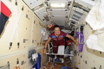 From NASA: "Russian cosmonaut Elena Serova, Expedition 41 flight engineer, floats through the Rassvet Mini-Research Module 1 (MRM1) of the International Space Station." Serova is the fourth Russian woman to fly to space to date. Photo Credit: NASA
