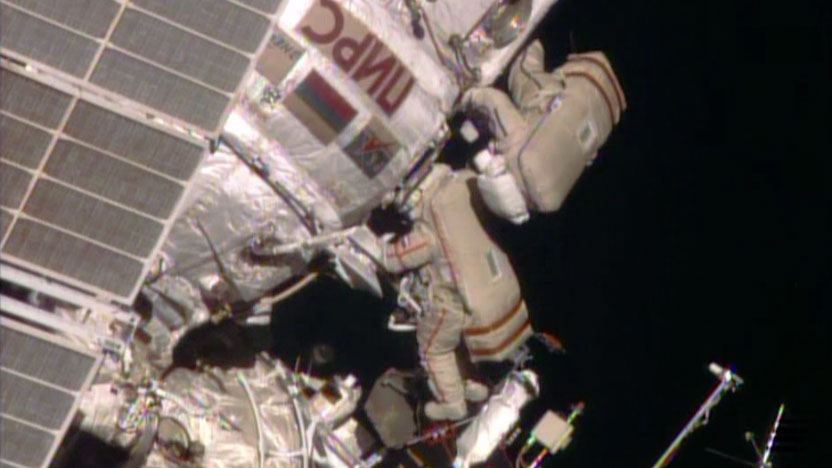 Max Surayev (bottom) and Aleksandr Samokutyayev (top) at the Pirs airlock during their EVA on Wednesday, 22 October. Photo Credit: NASA