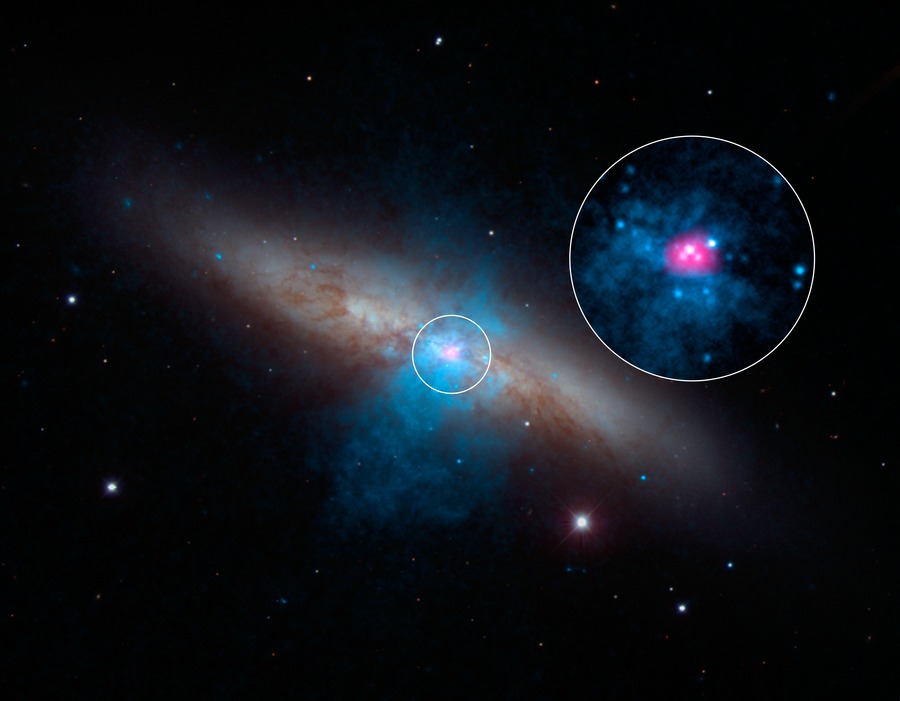 NASA's NuSTAR telescope recently discovered an ultra-luminous X-ray source (shown in the pink area in the circle) inside the nearby galaxy M82. This newly-discovered X-ray source was found to be powered by an extremely luminous pulsar, which produces the energy equivalent of 10 million Suns. Image Credit: NASA/JPL-Caltech