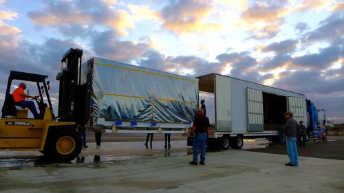 The transportation canister containing SMAP is offloaded from the truck that delivered it from NASA's Jet Propulsion Laboratory in Pasadena, California, to the Astrotech payload processing facility on Vandenberg Air Force Base in California. Image Credit: NASA/JPL-Caltech
