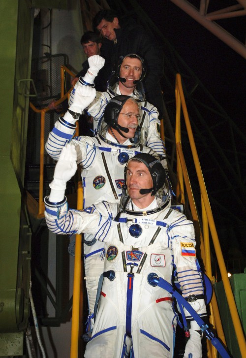 Roberto Vittori (top), alongside crewmates John Phillips and Sergei Krikalev, at Baikonur before the April 2005 launch of Soyuz TMA-6. Photo Credit: NASA