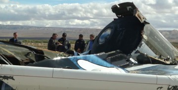 Investigators from ther NTSB looking over wreckage in the aftermath of SpaceshipTwo's fatal crash. Photo Credit: NTSB