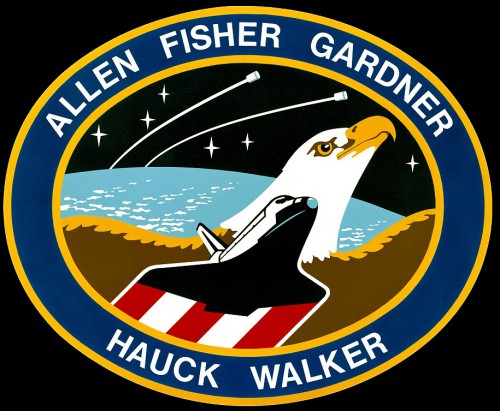 Rick Hauck, Dave Walker, Joe Allen, Anna Fisher and Dale Gardner were first assembled as a crew in September 1983, but their payload swung variously between a Tracking and Data Relay Satellite (TDRS), a Department of Defense mission...and eventually became one of the most spectacular shuttle flights of the 1980s. Image Credit: NASA