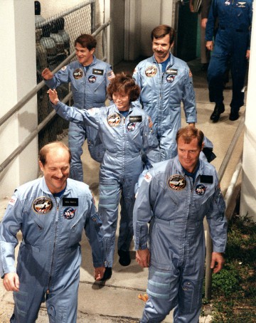 The STS-51A crew departs their quarters on the morning of 8 November 1984. Photo Credit: NASA