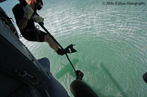 Combat search and rescue airmen with the USAFR 920th Rescue Wing, also known as the "Astronaut Guardian Angel Airmen" in action off Cocoa Beach, Fla. Photo Credit: Mike Killian