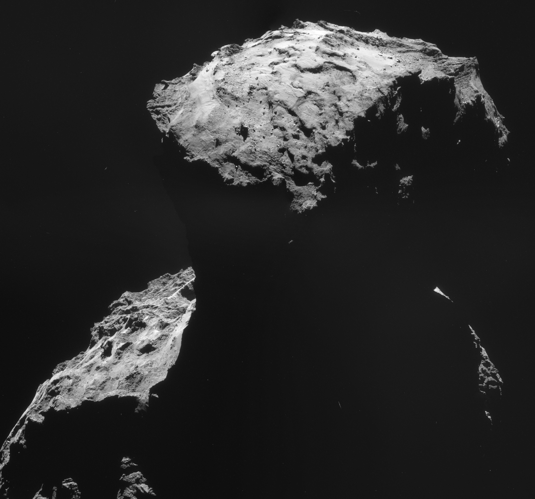 Philae’s landing site.  This four-image NAVCAM mosaic shows Philae’s landing site as Rosetta departed its 10 km orbit on 30 October, when the spacecraft was 26.8 km from the centre of the comet.  ESA/Rosetta/NAVCAM – CC BY-SA IGO 3.0