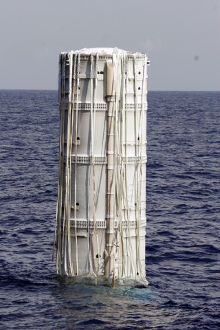 Ares I-X in upright configuration after splashdown in the Atlantic Ocean on 28 October 2009. Photo Credit: Matthew Travis/AmericaSpace