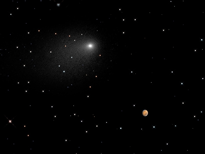 This composite NASA Hubble Space Telescope Image captures the positions of comet Siding Spring and Mars in a never-before-seen close passage of a comet by the Red Planet, which happened at 2:28 p.m. EDT October 19, 2014. Image and Caption Credit: NASA, ESA, PSI, JHU/APL, STScI/AURA