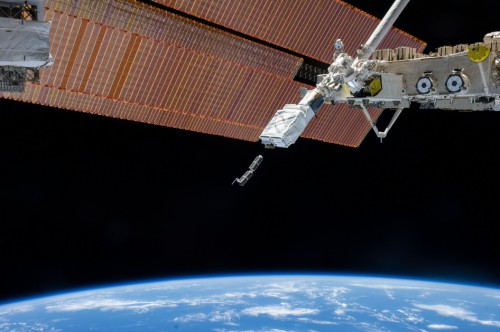 A couple of NanoRacks CubeSats being deployed from the International Space Station. Image Credit: NASA