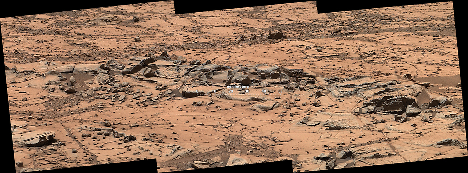 This small ridge, about 3 feet long, appears to resist wind erosion more than the flatter plates around it. Such differences are among the traits NASA's Curiosity Mars rover is examining at selected rock targets at the base of Mount Sharp. Curiosity's Mastcam acquired this view on Oct. 7, 2014.  Credit: NASA/JPL-Caltech/MSSS