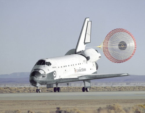 Boasting the first reusable drag chute, Atlantis concluded STS-66 with a touchdown at Edwards Air Force Base, Calif., on 14 November 1994. The 11-day mission was her longest flight to date. Photo Credit: NASA