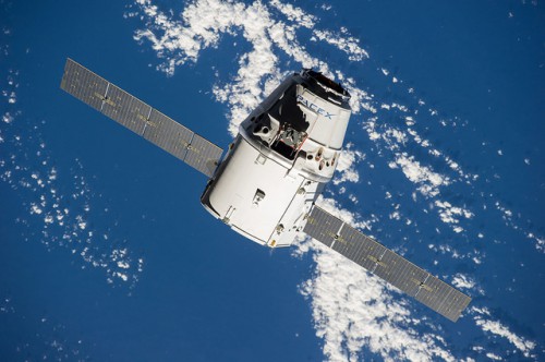 The CRS-4 Dragon spacecraft approaches the International Space Station (ISS) for berthing in September 2014. File Photo, Credit: NASA 