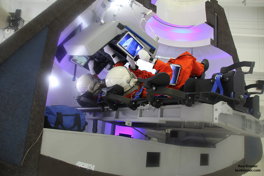 Boeing’s commercial CST-100 'Space Taxi' will carry a crew of five astronauts to low Earth orbit and the ISS from US soil.   Mockup with astronaut mannequins seated below pilot console and Samsung tablets as unveiled at its planned manufacturing facility at the Kennedy Space Center in Florida.  Credit: Ken Kremer - kenkremer.com