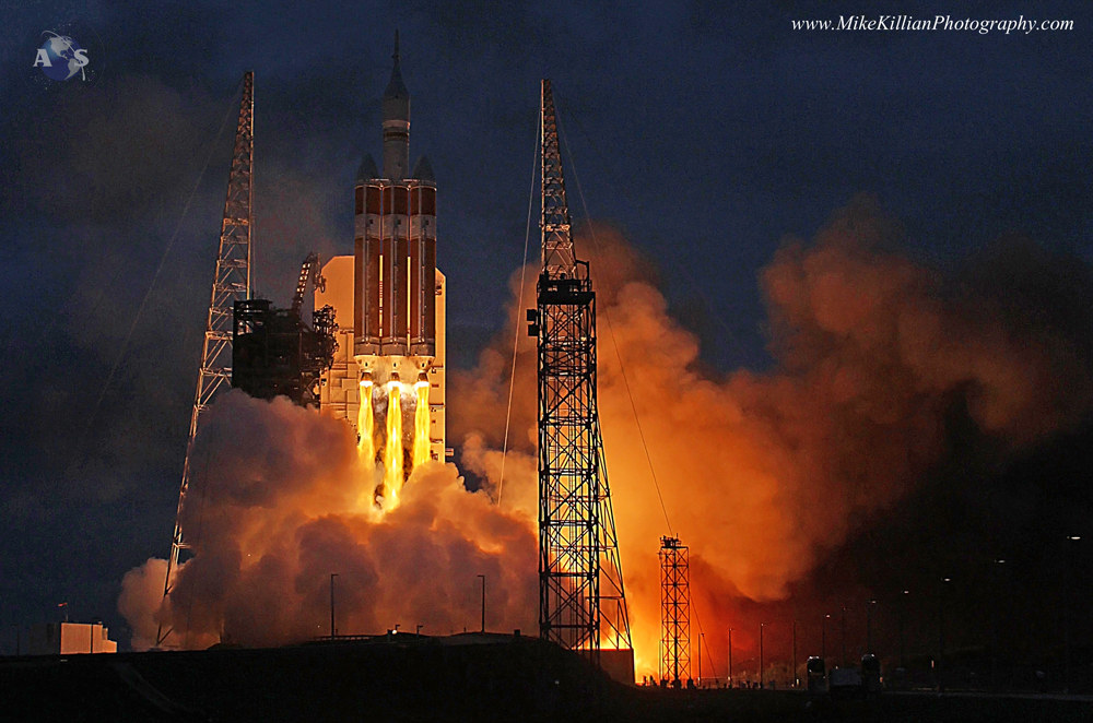 The launch of NASA’s Orion spacecraft on its first spaceflight, EFT-1, last December. The capsule is intended for deep-space crewed missions starting in the next decade atop the agency’s Space Launch System (SLS) rocket. Photo Credit: Mike Killian / AmericaSpace