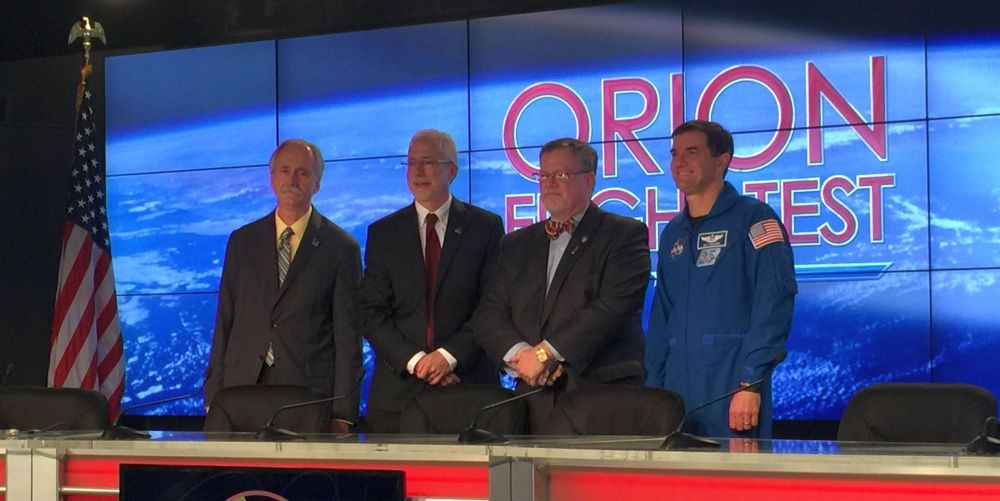 NASA's Associate Administrator for Human Exploration and Operations William Gerstenmaier, Orion Program Manager Mark Geyer, Lockheed Martin's Orion Program Leader Mike Hawes, and NASA's astronaut representative to the Orion program Rex Walheim pose after yesterday's successful Exploration Flight Test 1 (EFT-1) mission. Walheim discussed lessons learned from the shuttle era that can be applied to Orion. Photo Credit: Emily Carney