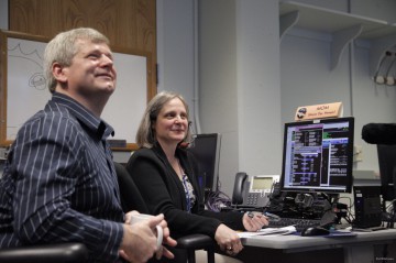 New Horizons Mission Operations Manager Alice Bowman and operations team member Karl Whittenburg watch the screens for data confirming that the New Horizons spacecraft had transitioned from hibernation to active mode on Dec. 6. Image Credit: NASA/JHU/APL
