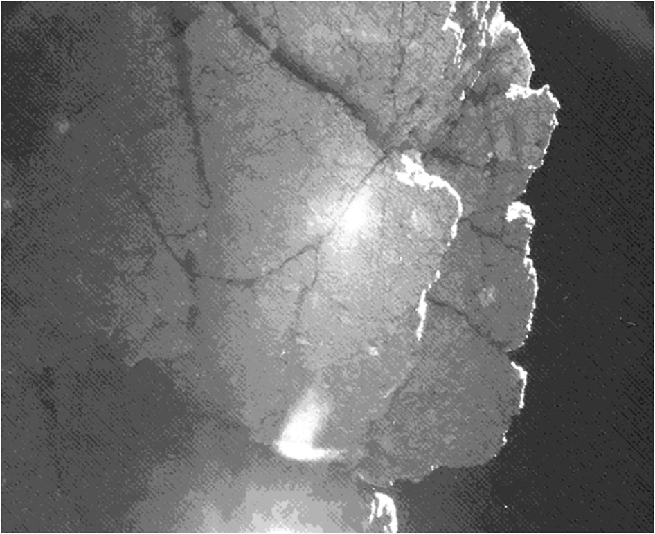 From the location where it came to rest after bounces, the Philae lander of the European Space Agency's Rosetta mission captured this view of a cliff on the nucleus of comet 67P/Churyumov-Gerasimenko. The feature is called "Perihelion Cliff." The image is from the lander's CIVA camera.  Credit: ESA/Rosetta/Philae/CIVA
