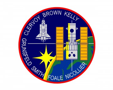 The STS-103 crew patch, with Hubble and the shuttle at center stage and the surnames of the seven astronauts around the border. Image Credit: NASA