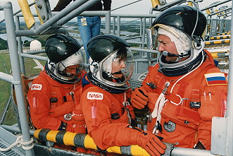 STS-63 crew members (from left) Mike Foale, Janice Voss and Vladimir Titov participate in the Terminal Countdown Demonstration Test (TCDT) at Pad 39B. Photo Credit: NASA