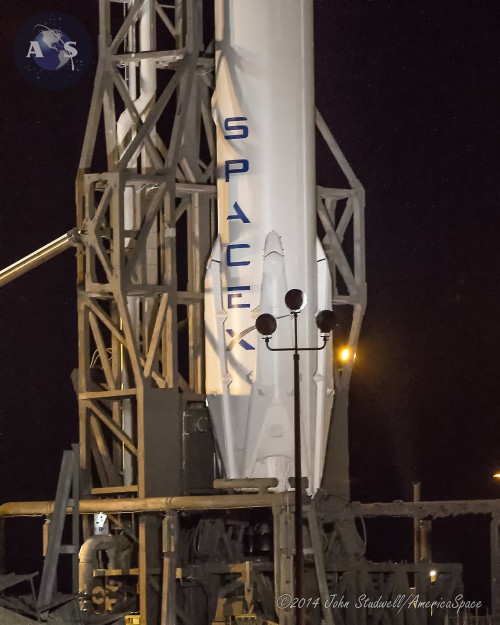 The CRS-5 mission is expected to make the first attempt to land on an ocean-based barge, using its landing legs. Photo Credit: Mike Killian/AmericaSpace