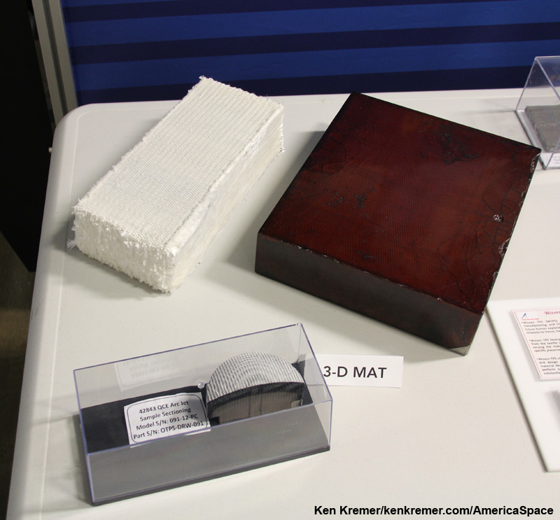 Comparison of 3-D woven thermal protection material.  White block on left is 3-D woven material as it comes from  the loom at Bally Ribbon Mills, Bally Pa. The dark orange block is the full compression pad size article that comes off after resin infusion and is machined into compression pad.  Sectioned article in box at bottom shows the resin infused block after arc jet treatment at NASA Ames that simulates scorching heating conditions after  lunar return.   Credit: Ken Kremer/kenkremer.com/AmericaSpace