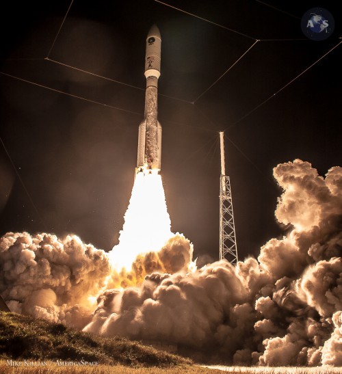 The Atlas V 551 rockets into the darkened Florida sky at 8:04 p.m. EST Tuesday, 20 January, to deliver MUOS-3 into orbit. Photo Credit: Mike Killian / AmericaSpace