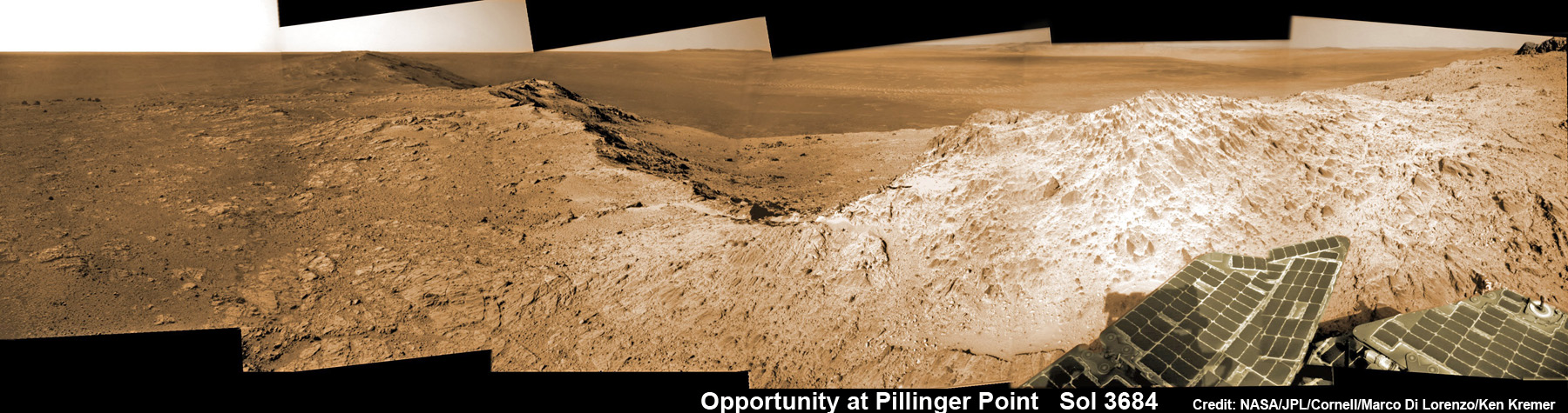 Opportunity Mars rover peers into vast Endeavour Crater from Pillinger Point mountain ridge named in honor of Colin Pillinger, the Principal Investigator for the British Beagle 2 lander built to search for life on Mars. Pillinger passed away from a brain hemorrhage on May 7, 2014. This navcam camera photo mosaic was assembled from images taken on June 5, 2014 (Sol 3684) and colorized. Credit: NASA/JPL/Cornell/Marco Di Lorenzo/Ken Kremer-kenkremer.com