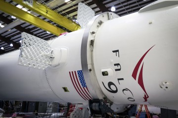 The system of hypersonic grid fins will deploy from the upper section of the first stage during descent to enhance controllability. Photo Credit: SpaceX