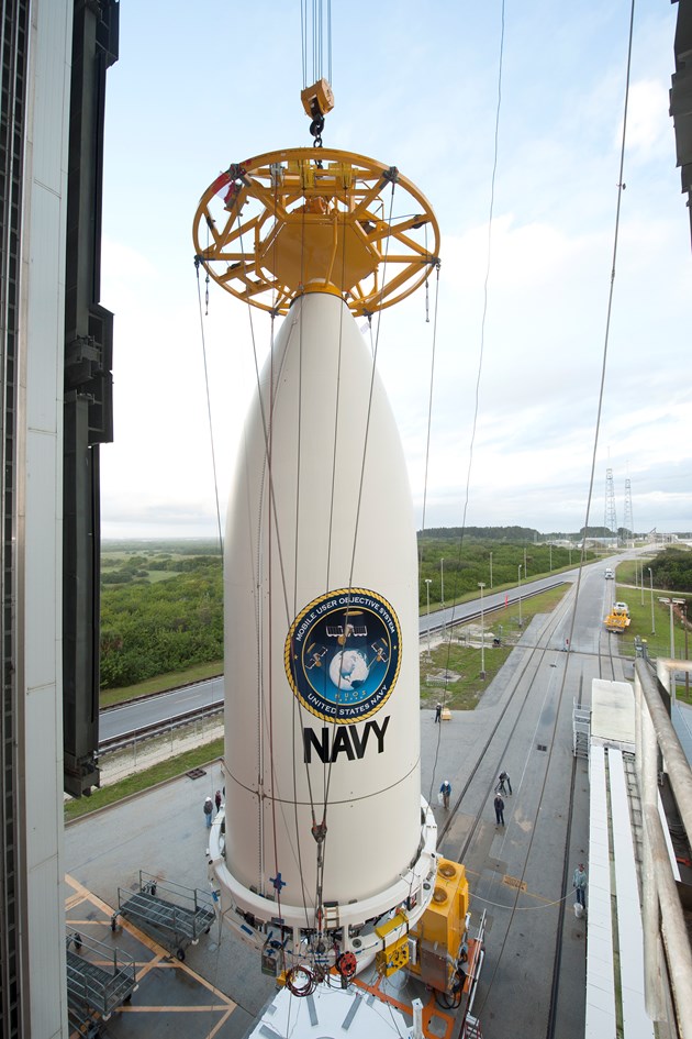 The bulbous payload fairing and MUOS-3 undergo preparations for installation atop the Atlas V 551. Photo Credit: ULA