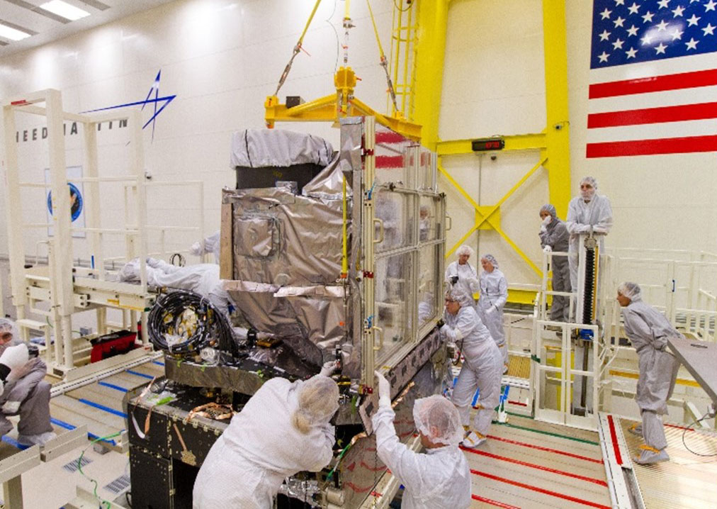 The GOES-R Advanced Baseline Imager (ABI) is installed onto the GOES-R spacecraft at Lockheed Martin in Littleton, Colorado, on October 13, 2014. Photo Credit: Lockheed Martin
