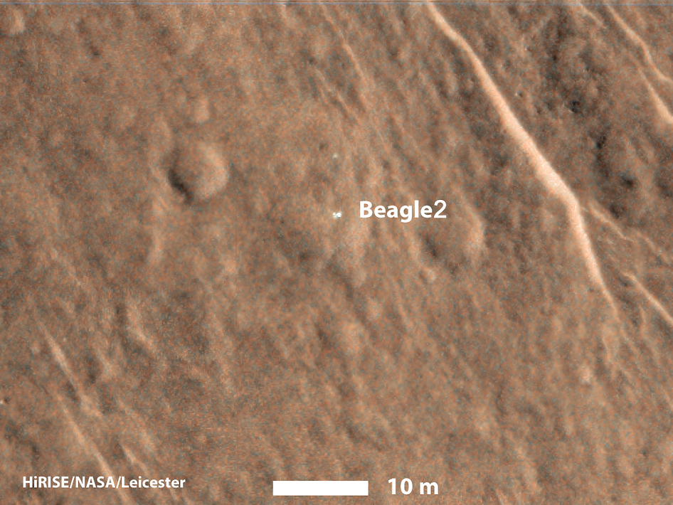 Beagle 2 Lander Observed by Mars Reconnaissance Orbiter.  This annotated image from NASA's Mars Reconnaissance Orbiter shows a bright feature interpreted as the United Kingdom's Beagle 2 Lander, which was never heard from after its expected Dec. 25, 2003, landing. The image was taken by the orbiter's HiRISE camera on Dec. 15, 2014.  Credit: NASA/JPL-Caltech/Univ. of Arizona/University of Leicester