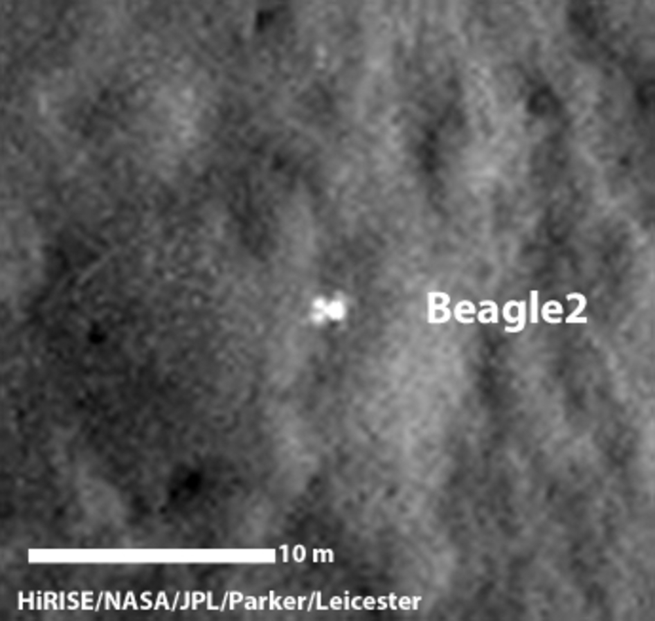 Beagle 2 Lander on Mars, With Panels Deployed .  A configuration interpreted as the United Kingdom's Beagle 2 Lander, with solar panels at least partially deployed, is indicated in this composite of two images from the High Resolution Imaging Science Experiment (HiRISE) camera on NASA's Mars Reconnaissance Orbiter.  Credit:   NASA/JPL-Caltech/Univ. of Arizona/University of Leicester