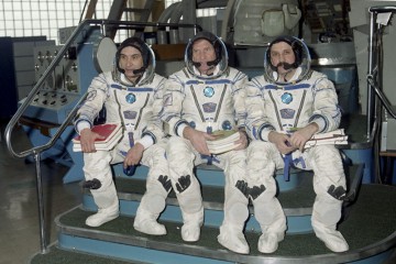 Pictured during training, Valeri Polyakov (left) launched aboard Soyuz TM-18 with crewmates Viktor Afanasyev (center) and Yuri Usachev. Photo Credit: Joachim Becker/SpaceFacts.de
