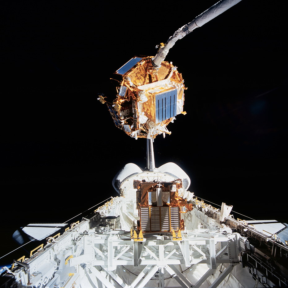 Grappled by Endeavour's Remote Manipulator System (RMS) mechanical arm, the Japanese Space Flyer Unit (SFU) satellite is readied for installation in the payload bay. Photo Credit: NASA, via Joachim Becker/SpaceFacts.de