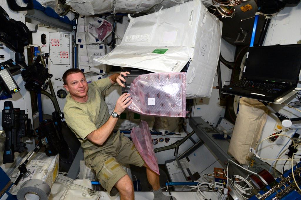 NASA astronaut Terry Virts packing stuff that will return to Earth on the SpaceX CRS-5 Dragon, which returned to Earth in February 2015. Photo Credit: Terry Virts / NASA (@AstroTerry via Twitter)
